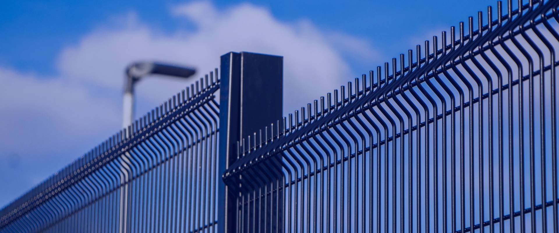 A piece of 358 high security fences under the blue sky.