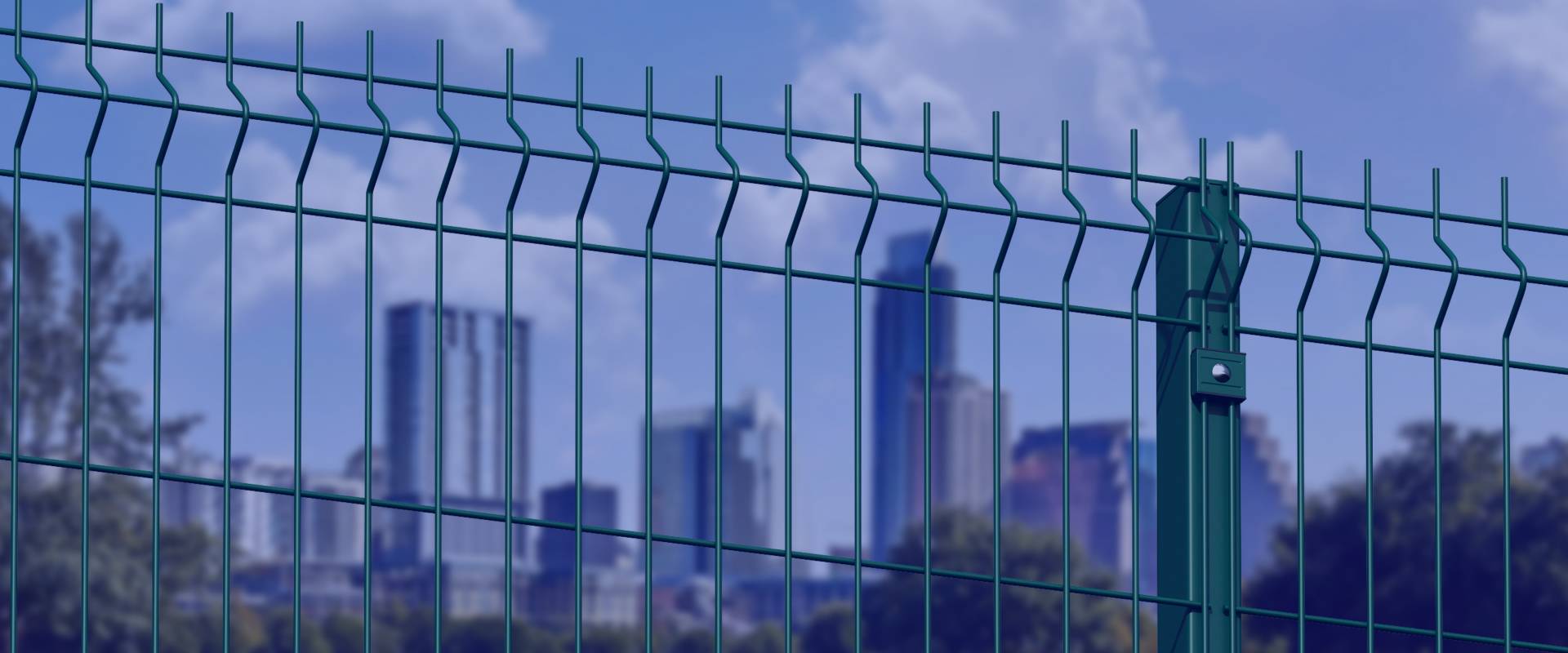 Green Curved welded wire mesh fences are surrounding the grassland.
